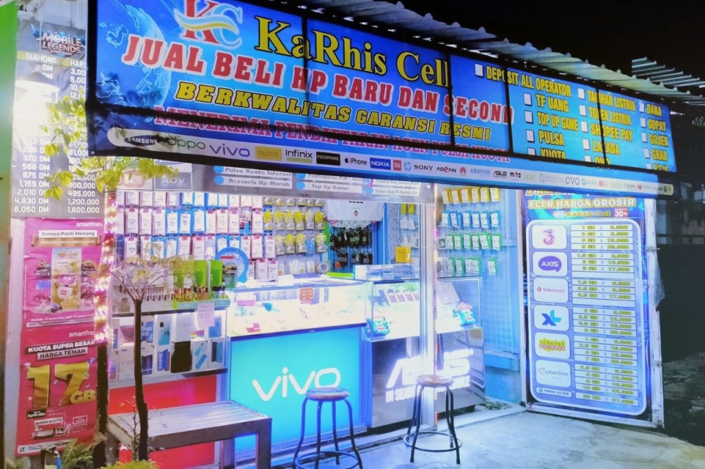 spanduk konter pulsa